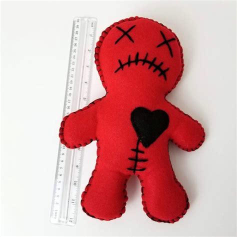 Brick red voodoo doll
